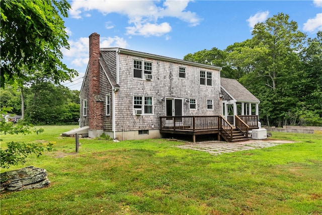140 Long Hwy, Little Compton, RI 02837 - rear view of house with a chimney, a deck, a lawn, and cooling unit