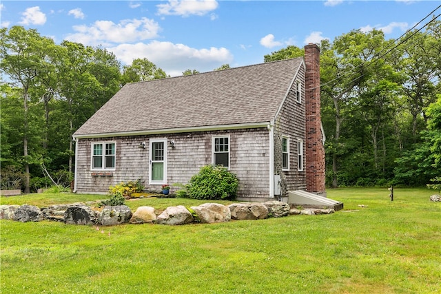 140 Long Hwy, Little Compton, RI 02837 - cape cod home featuring a chimney, a front lawn, and a shingled roof