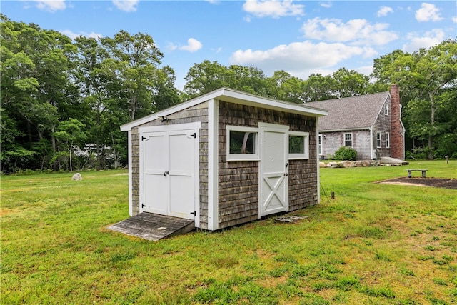 140 Long Hwy, Little Compton, RI 02837 - view of shed featuring view of wooded area