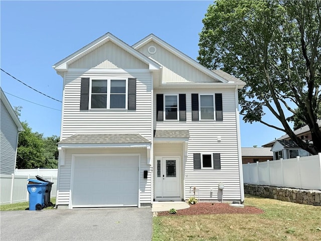 77 Batcheller Ave, Cranston, RI 02920 - view of front facade featuring an attached garage, roof with shingles, and driveway