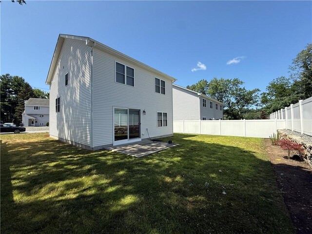 77 Batcheller Ave, Cranston, RI 02920 - rear view of property with a patio area