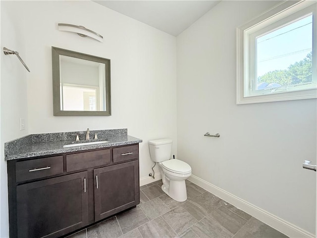 77 Batcheller Ave, Cranston, RI 02920 - bathroom featuring baseboards and vanity
