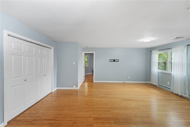 22 Riverdale Rd, Westerly, RI 02891 - unfurnished living room featuring light wood finished floors and baseboards