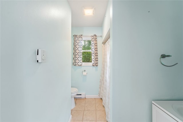 22 Riverdale Rd, Westerly, RI 02891 - bathroom with baseboard heating, tile patterned flooring, vanity, and curtained shower