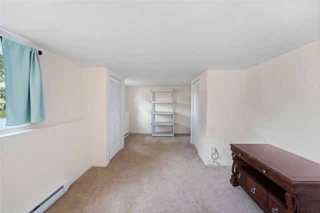 22 Riverdale Rd, Westerly, RI 02891 - spare room with baseboard heating and light carpet