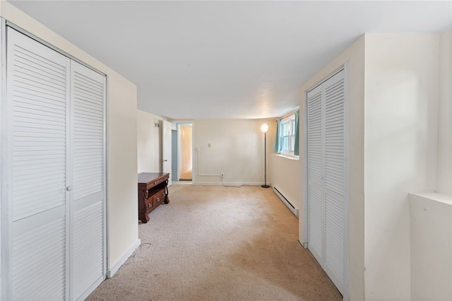 22 Riverdale Rd, Westerly, RI 02891 - hall with carpet floors and a baseboard radiator