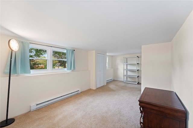 22 Riverdale Rd, Westerly, RI 02891 - unfurnished bedroom with a baseboard heating unit and carpet flooring