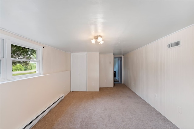 22 Riverdale Rd, Westerly, RI 02891 - spare room with baseboard heating and light carpet