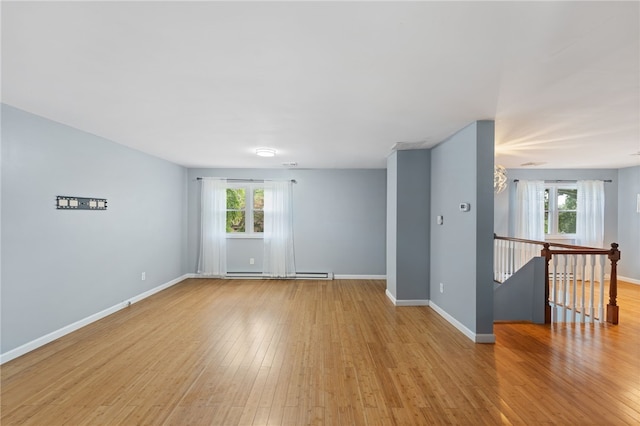 22 Riverdale Rd, Westerly, RI 02891 - unfurnished room with a baseboard radiator and light wood-type flooring