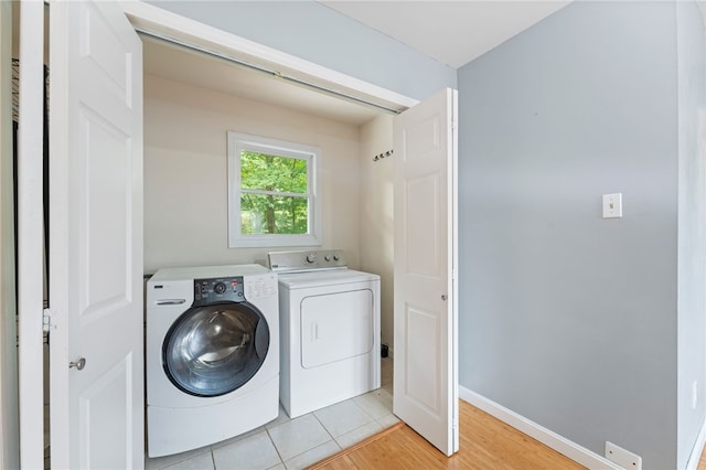 22 Riverdale Rd, Westerly, RI 02891 - laundry room with independent washer and dryer and light wood-type flooring