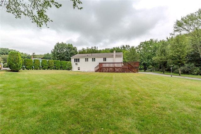 422 Buxton St, North Smithfield, RI 02896 - view of grassy yard with a wooden deck and stairs