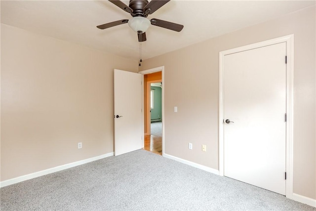 422 Buxton St, North Smithfield, RI 02896 - unfurnished bedroom featuring carpet flooring, a ceiling fan, and baseboard heating