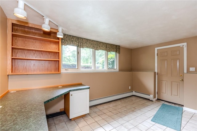 422 Buxton St, North Smithfield, RI 02896 - unfurnished office featuring built in desk, a baseboard radiator, and light tile patterned floors