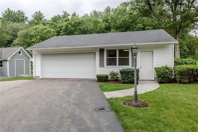 422 Buxton St, North Smithfield, RI 02896 - ranch-style house featuring driveway, a garage, a front lawn, roof with shingles, and a shed