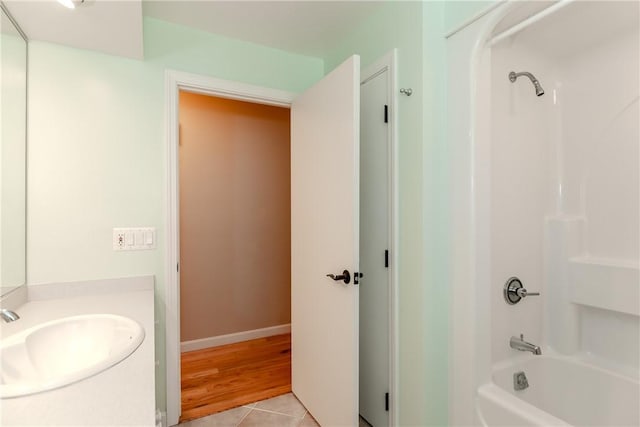 422 Buxton St, North Smithfield, RI 02896 - full bath with washtub / shower combination, vanity, and tile patterned floors