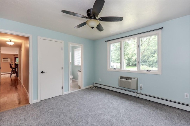422 Buxton St, North Smithfield, RI 02896 - unfurnished bedroom with a baseboard heating unit, a wall mounted AC, a wall unit AC, carpet floors, and ensuite bath