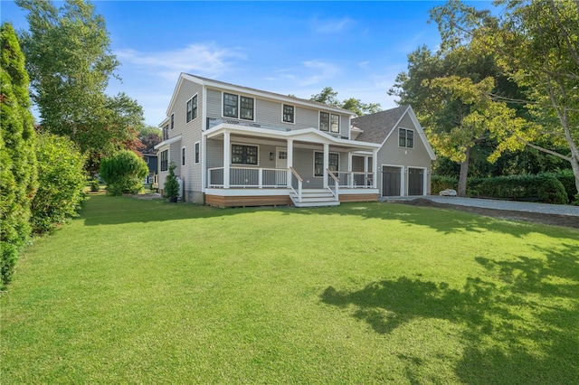 26 Westmoreland St, Narragansett, RI 02882 - view of front of home featuring covered porch, a front lawn, driveway, and a garage