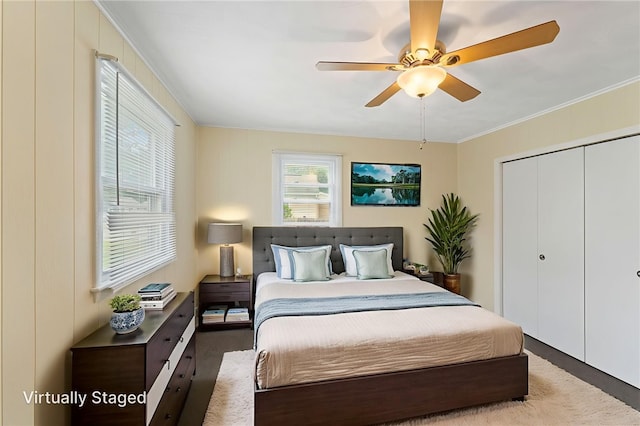 67 Vera St, Warwick, RI 02886 - carpeted bedroom with crown molding, a closet, and a ceiling fan