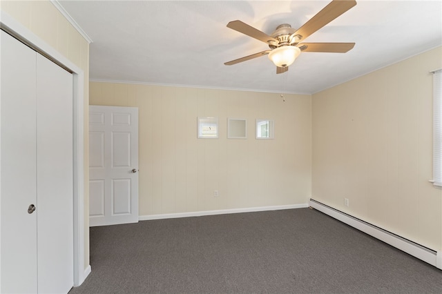 67 Vera St, Warwick, RI 02886 - unfurnished bedroom featuring a baseboard heating unit, carpet floors, crown molding, a closet, and ceiling fan