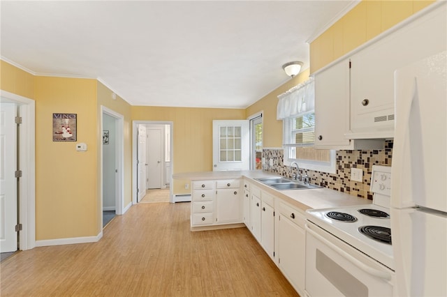 67 Vera St, Warwick, RI 02886 - kitchen featuring white appliances, ventilation hood, light wood finished floors, light countertops, and crown molding