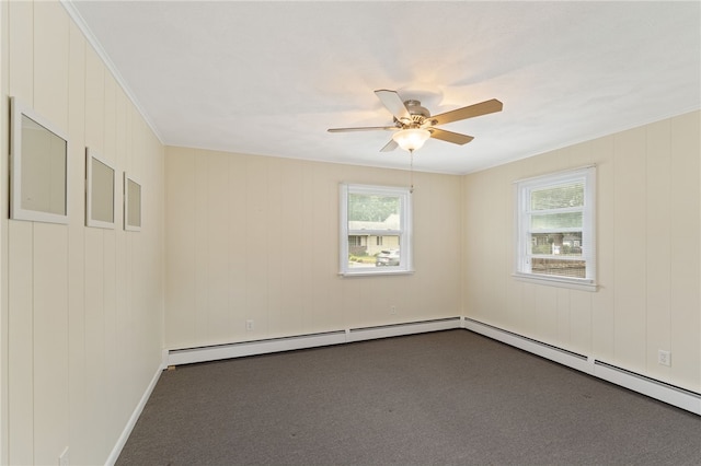 67 Vera St, Warwick, RI 02886 - spare room featuring ceiling fan, baseboard heating, and dark colored carpet