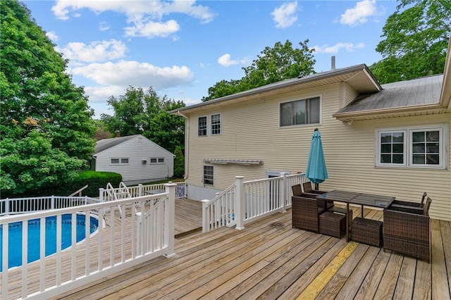203 Pulaski St, West Warwick, RI 02893 - wooden deck featuring an outdoor pool