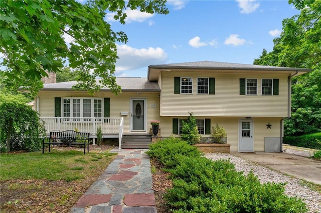203 Pulaski St, West Warwick, RI 02893 - split level home with a chimney