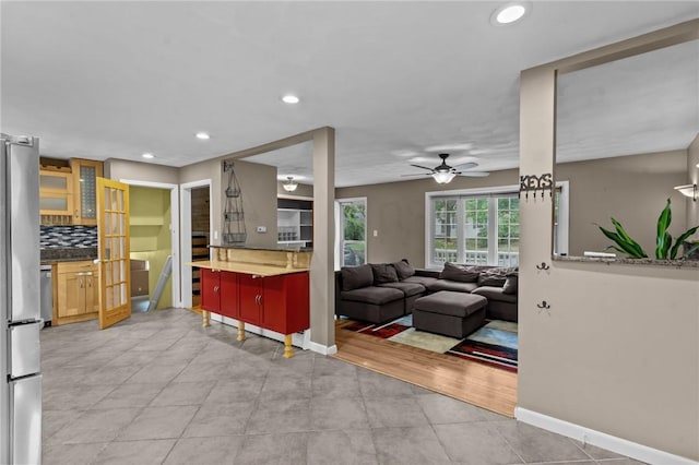 203 Pulaski St, West Warwick, RI 02893 - living area featuring a ceiling fan, recessed lighting, and light tile patterned flooring
