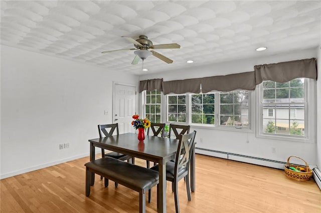203 Pulaski St, West Warwick, RI 02893 - dining room featuring a baseboard radiator, wood finished floors, ceiling fan, and recessed lighting