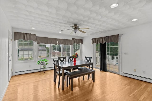 203 Pulaski St, West Warwick, RI 02893 - dining area featuring baseboard heating, a ceiling fan, light wood finished floors, and recessed lighting