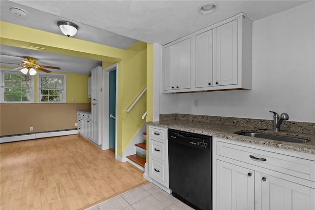203 Pulaski St, West Warwick, RI 02893 - kitchen with black dishwasher, baseboard heating, a ceiling fan, and white cabinetry
