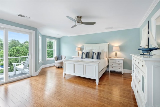 100 Algonquin Rd Unit 13, Narragansett, RI 02882 - bedroom featuring access to outside, wood finished floors, ornamental molding, and a ceiling fan