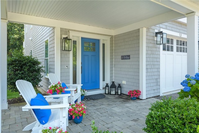 100 Algonquin Rd Unit 13, Narragansett, RI 02882 - doorway to property featuring a porch