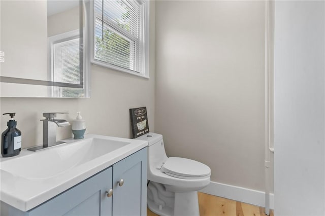1413 Broad St, Providence, RI 02905 - bathroom featuring vanity and wood finished floors