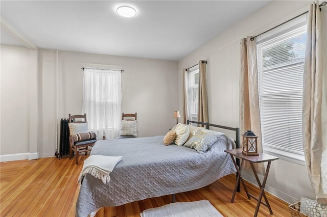 1413 Broad St, Providence, RI 02905 - bedroom featuring multiple windows and wood finished floors