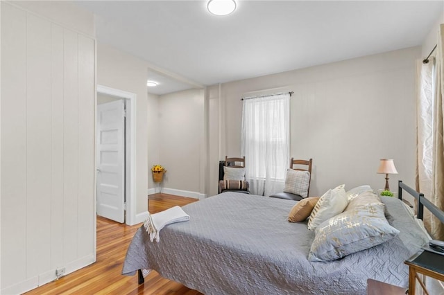 1413 Broad St, Providence, RI 02905 - bedroom featuring wood finished floors and baseboards