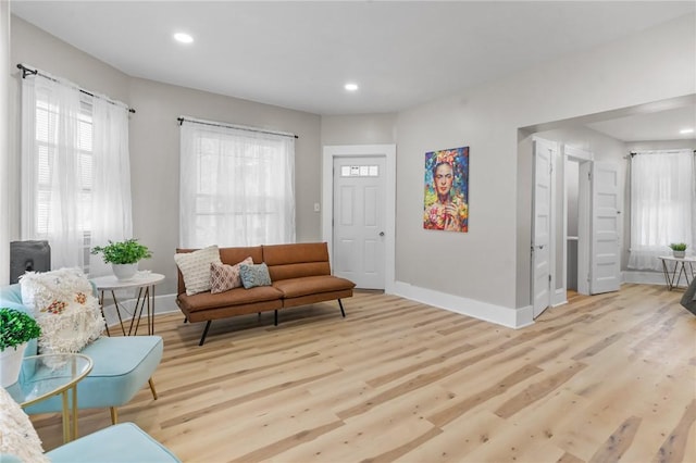 1413 Broad St, Providence, RI 02905 - living area featuring healthy amount of natural light, light wood-type flooring, and recessed lighting