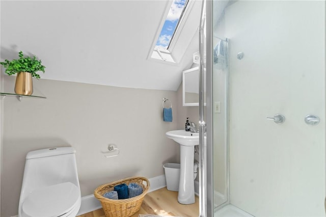 1413 Broad St, Providence, RI 02905 - full bath featuring a shower stall, a skylight, vaulted ceiling, and wood finished floors