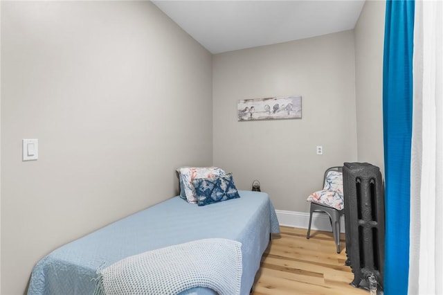 1413 Broad St, Providence, RI 02905 - bedroom featuring light wood-style flooring and baseboards