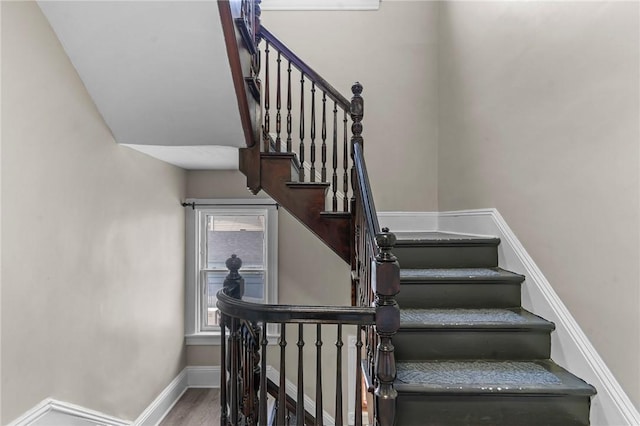 1413 Broad St, Providence, RI 02905 - stairs featuring baseboards and wood finished floors
