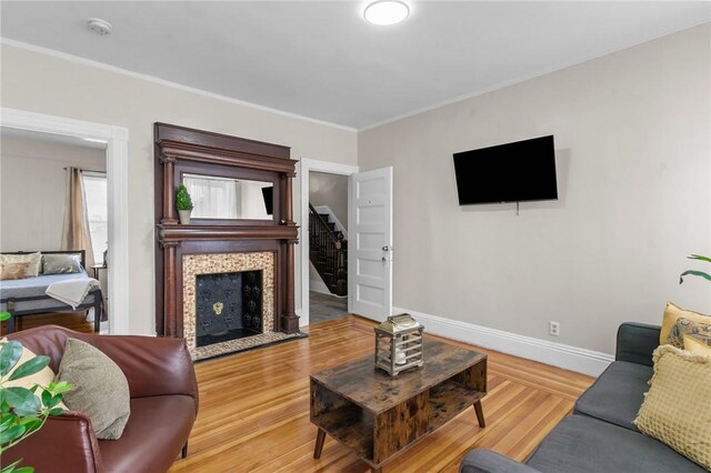 1413 Broad St, Providence, RI 02905 - living room with stairs, wood finished floors, and ornamental molding