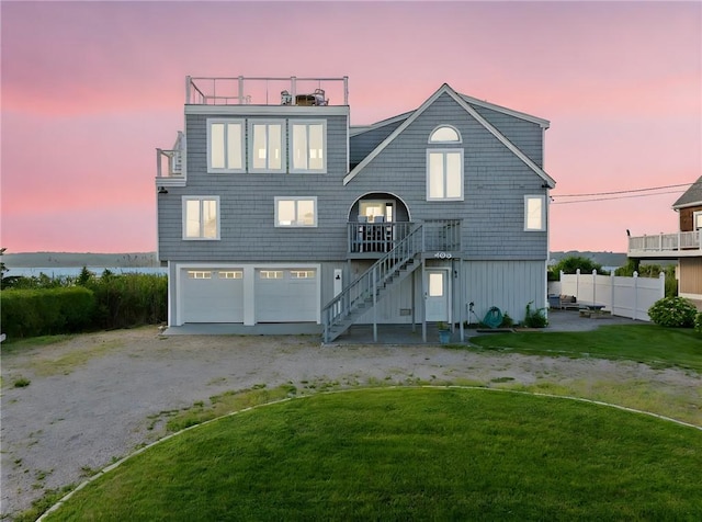 408 Atlantic Ave, Westerly, RI 02891 - view of front of property featuring stairs, dirt driveway, and an attached garage