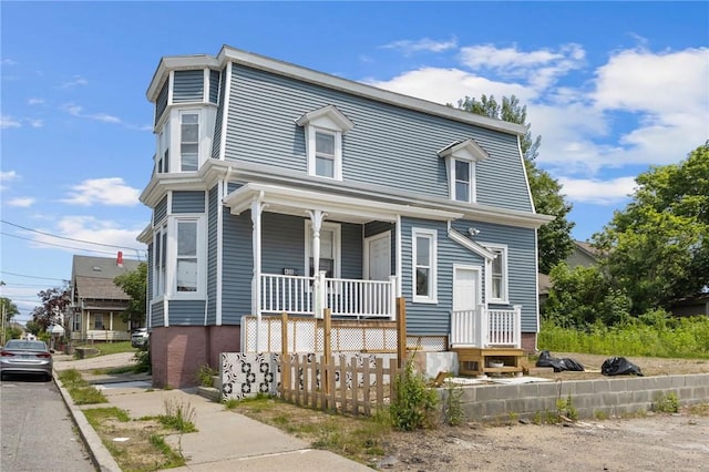 406 Cahill St, Providence, RI 02905 - view of front facade featuring covered porch