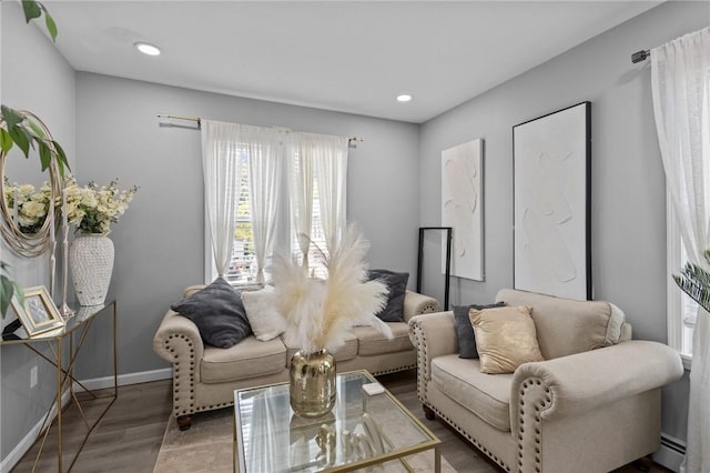 406 Cahill St, Providence, RI 02905 - living area featuring wood finished floors, a baseboard heating unit, and recessed lighting