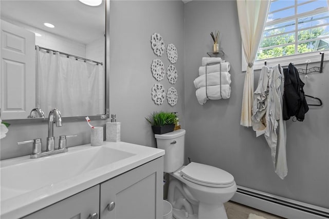 406 Cahill St, Providence, RI 02905 - full bath featuring a baseboard radiator and vanity