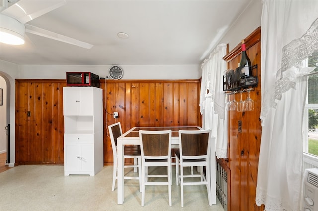 2 Glen Dr, Warwick, RI 02889 - dining area with arched walkways and wooden walls