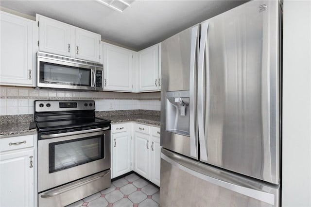 26 Pheasant Run Unit A, Smithfield, RI 02917 - kitchen with stainless steel appliances, white cabinetry, and backsplash