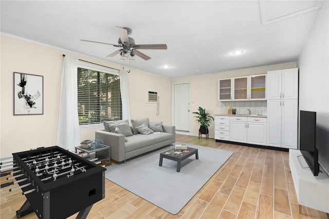 26 Pheasant Run Unit A, Smithfield, RI 02917 - living area with a ceiling fan, light wood-style flooring, recessed lighting, and ornamental molding
