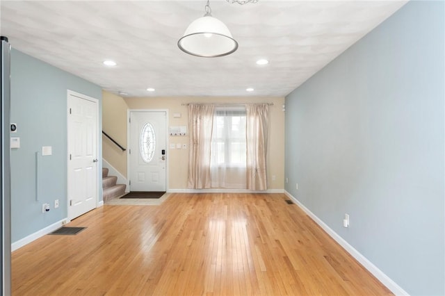 174 Long St, Warwick, RI 02886 - foyer with stairs, light wood-style floors, and recessed lighting