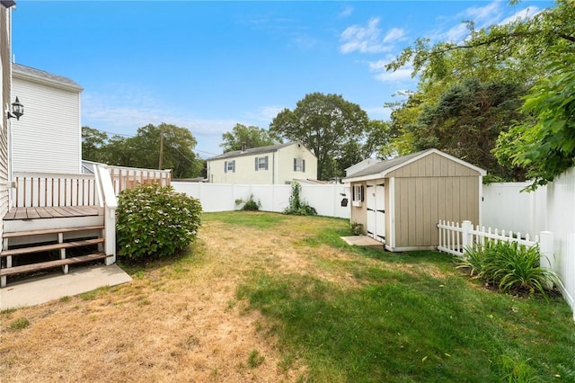 174 Long St, Warwick, RI 02886 - fenced backyard with a storage unit and a deck
